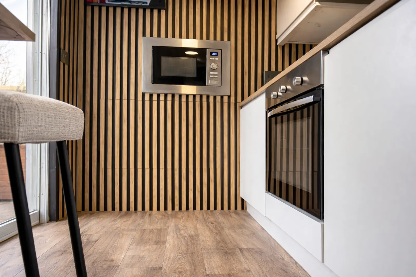 Inside the kitchen pod showing the bench and sink.